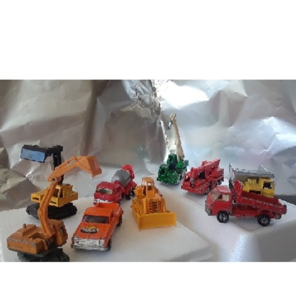 9 Piece of Antique Construction Vehicles